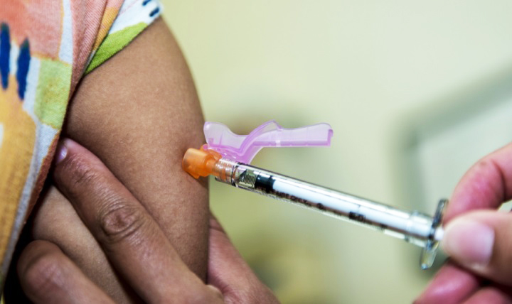 HPV vaccine being injected