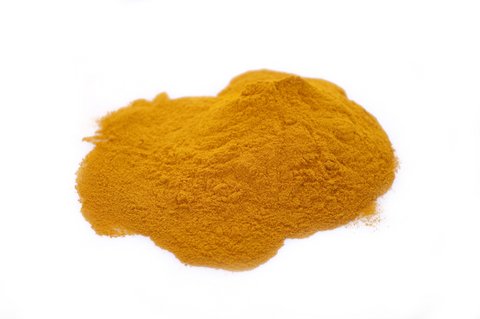 a pile of turmeric (source of curcumin)