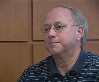 David Fry sitting in office