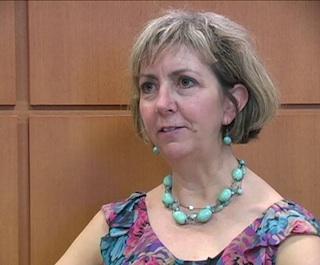 Gail Eckhardt sitting in office