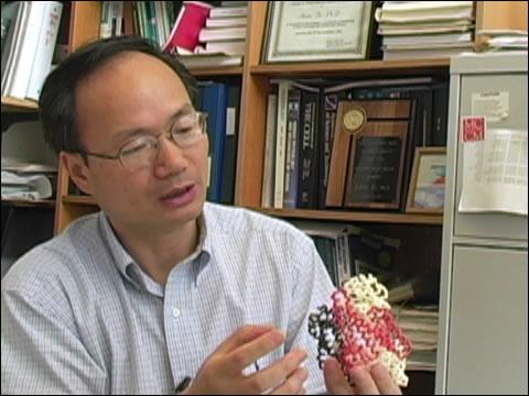 Haian Fu sitting in an office