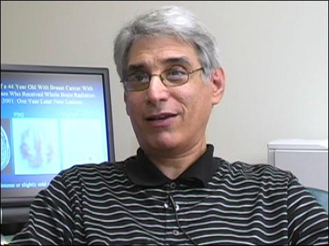 Mark Goodman sitting in an office