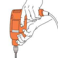 hand holding a drill
