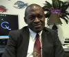 Dr. Alex Adjei sitting in an office